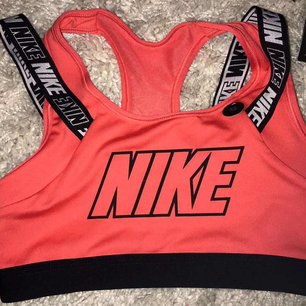 neon red nike sports bra